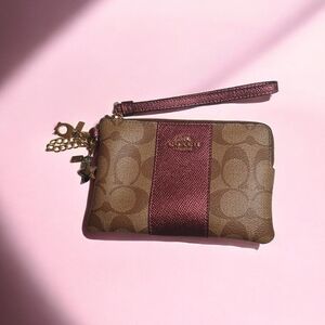 Coach Corner Zip Wristlet in Signature Canvas with Metallic Wine Stripe n Charms